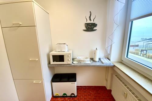 Borkum Ferienwohnung Meerblick Appartement &quot;Schöne Aussichten&quot; - Küche mit Aussicht