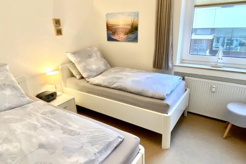 Borkum Ferienwohnung Meerblick Appartement &quot;Schöne Aussichten&quot; - 2. Schlafzimmer mit 2 Einzelbetten