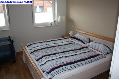 Borkum Ferienhaus Dat Rosenhuus - Schlafzimmer II im ersten OG