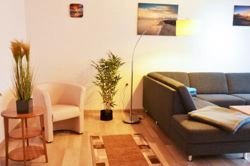 Borkum Ferienwohnung Ferienappartements Süderstraße - Appartement 100 - Wohnzimmer