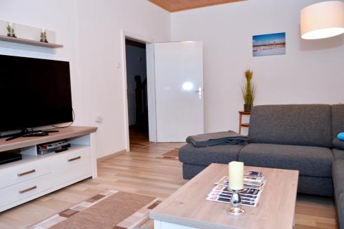 Borkum Ferienwohnung Ferienappartements Süderstraße - Appartement 100 - Wohnzimmer