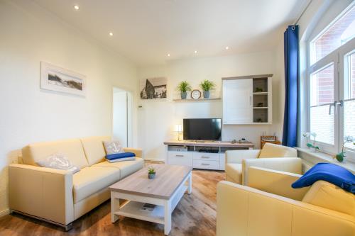 Borkum Ferienhaus Daheim - Wuldegapstraße 11 Wohnzimmer EG12