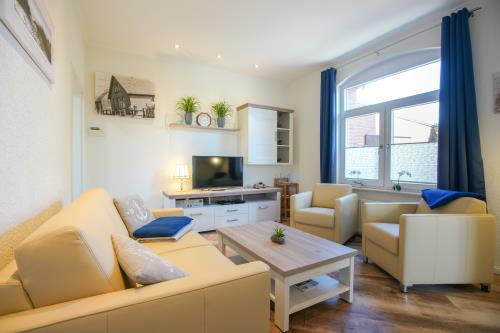 Borkum Ferienhaus Daheim - Wuldegapstraße 11 Wohnzimmer EG