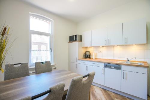 Borkum Ferienhaus Daheim - Wuldegapstraße 11 Kueche EG5