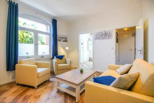 Borkum Ferienhaus Daheim - Wuldegapstraße 11 Wohnzimmer EG3