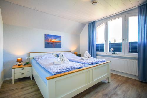 Borkum Ferienhaus Daheim - Wuldegapstraße 11 Schlafzimmer 2 1OG 1