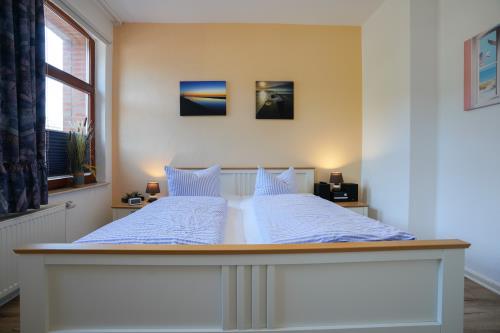 Borkum Ferienhaus Daheim - Schlafzimmer unten