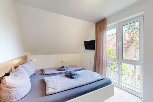 Borkum Ferienhaus Farah - 09 Schalfzimmer 1