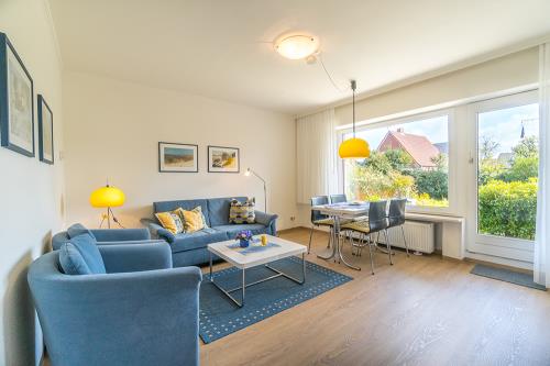 Borkum Ferienwohnung Ferienhaus Kiebitzdelle - 3 - Terrasse - Ausstattung 1
