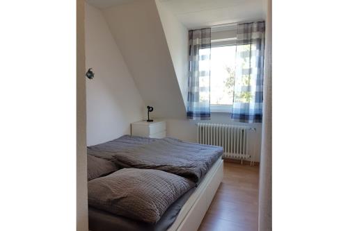 Borkum Ferienhaus Zeitinsel - ZeitInsel - zweites schlafzimmer im og 