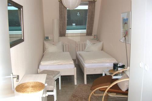 Borkum Ferienwohnung Bruns *** - Schlafzimmer