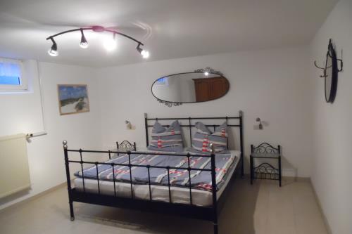 Borkum Ferienwohnung Deichterrasse - Schlafzimmer - Doppelbett