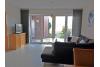 Borkum Ferienwohnung Düne 47 (Nessen) - Wohnzimmer mit Terrasse