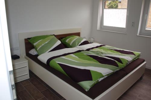 Borkum Ferienwohnung Kleine Möwe - Schlafzimmer 1