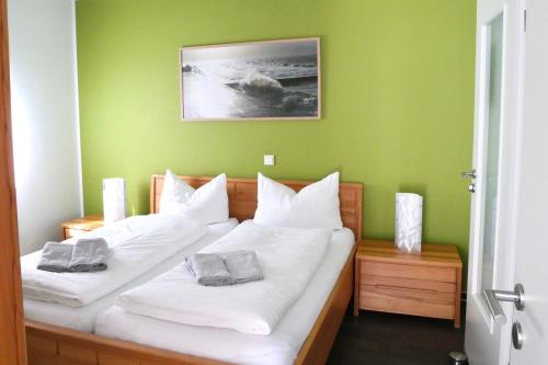 Borkum Ferienwohnung Leuchtbake - Bett