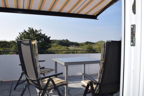 Borkum Ferienwohnung Peters Hus OG - sonneterrasse mit sonnenschutz
