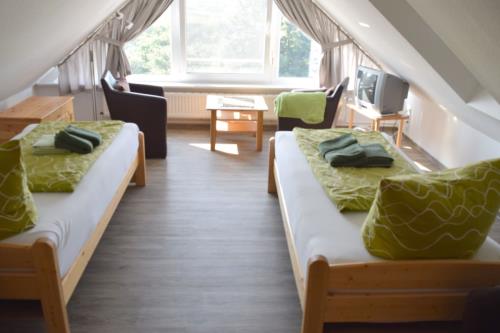 Borkum Ferienwohnung Peters Hus OG - schalfzimmer im spitzboden