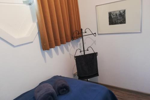 Borkum Ferienwohnung Scholle, Mövennest II - Schlafzimmer