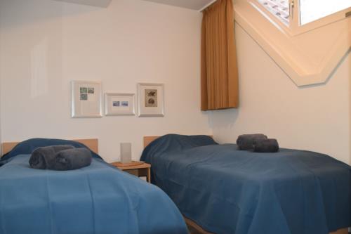 Borkum Ferienwohnung Scholle, Mövennest II - Schlafzimmer