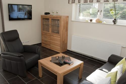 Borkum Ferienwohnung Sonnenidyll - wohnzimmer mit lcd tv