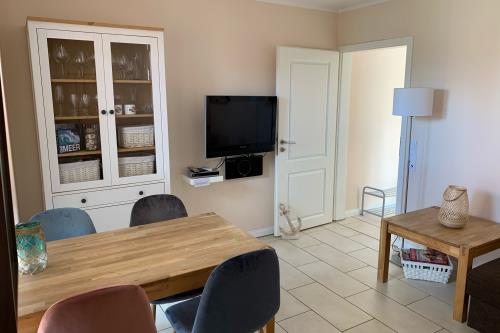 Borkum Ferienwohnung Südperle - Wohnzimmer mit flat-TV