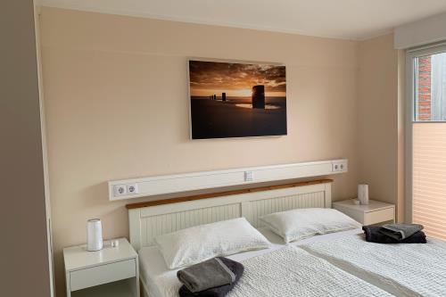 Borkum Ferienwohnung Südperle - Schlafzimmer mit Gartenblick