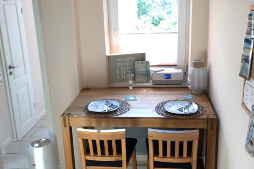 Borkum Ferienwohnung Südperle - Hochtisch in der Küche / Internetradio