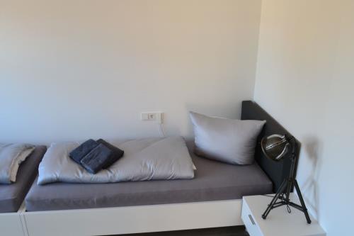 Borkum Ferienwohnung Wellenklang - das schlafzimmer aus einer anderen persp