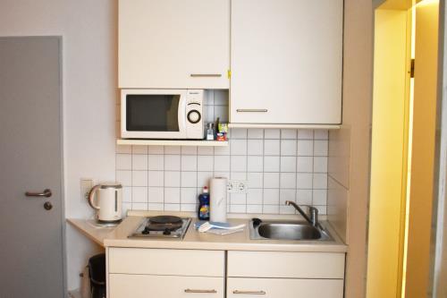 Borkum Ferienwohnung Haus Posthus - Küchenbereich 105