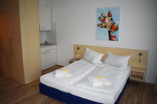 Borkum Ferienwohnung Haus Posthus - Appartement 103 - Schlafbereich 103