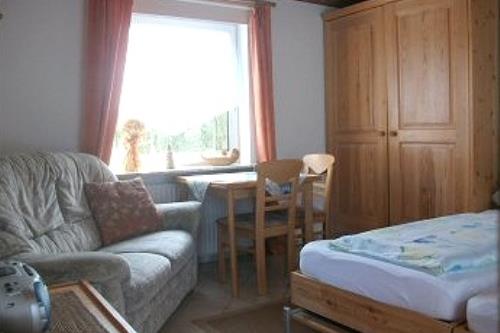 Borkum Ferienwohnungen Weiß - Herzmuschel -  Wohn-Schlafraum