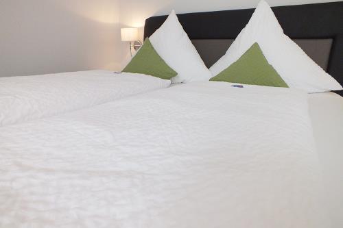 Borkum Ferienwohnung Haus Ennen - Appartement 4 - Schlafzimmer