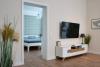 Borkum Ferienwohnung Sommerköken - Wohnzimmer mit Flachbild-TV