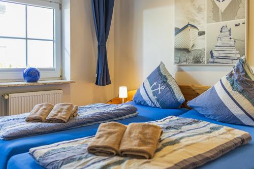 Borkum Ferienwohnung Jantje / Haus Leuchtturmkieker - Schlafzimmer 1