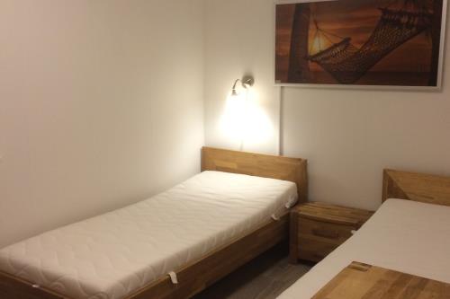 Borkum Haus Norderoog Ferienwohnungen Hindenburgstraße 56 - Nr.1 - Terr. + PKW-Stellplatz - Whg.1 - Schlafzimmer