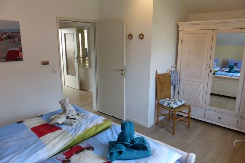 Borkum Ferienwohnung Haus Norderoog - 13 - Schlafzimmer