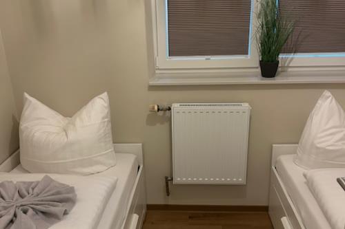 Borkum Ferienwohnungen Haus Passat - Ebbe - Schlafzimmer2,1