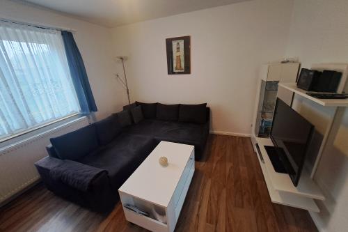 Borkum Ferienwohnung Haus Silbermöwe - Silbermöwe Bungalow - Wohnzimmer