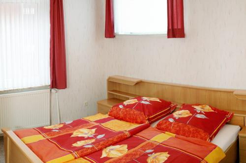 Borkum Haus Staiger-van Dyken - Ferienwohnung 2 - Schlafzimmer 1