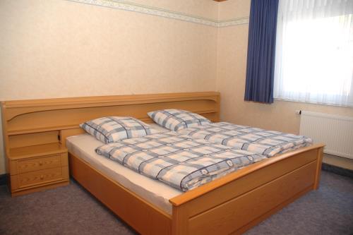 Borkum Haus Thilo - Ferienwohnung 1 - Schlafzimmer 1