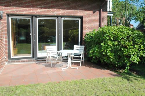 Borkum Haus Thilo - Ferienwohnung 1 - Terrasse mit Garten