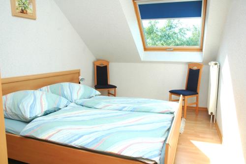 Borkum Haus Thilo - Ferienwohnung 3 - Schlafzimmer 1