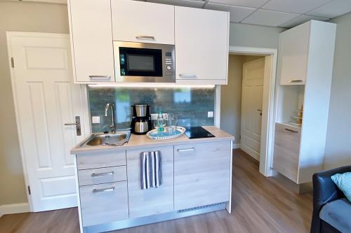 Borkum Ferienwohnung Haus Windröschen - App. 1 - Appartement 1 · Küche