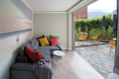 Borkum Ferienwohnung Haus Windröschen - App. 2 - Appartement 2 • Couch 140 x 200 Schlaf