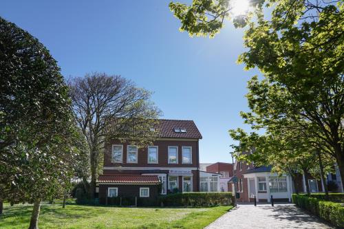 Borkum Ferienwohnung Hotel Windrose Ferienappartements - Aussenansicht