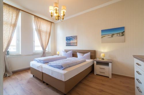 Borkum Ferienwohnung Hotel Windrose Ferienappartements - Austernfischer - Schlafzimmer