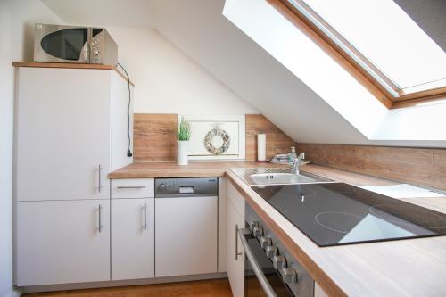 Borkum Ferienwohnung Hotel Windrose Ferienappartements - Seehund - Berg Hotel Windrose Seehund Kueche3