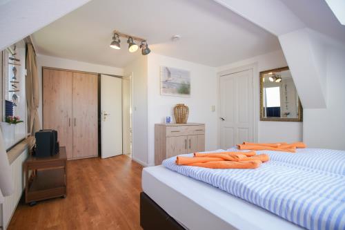 Borkum Ferienwohnung Hotel Windrose Ferienappartements - Seehund - Berg Hotel Windrose Seehund Schlafzimmer