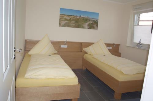 Borkum Ferienwohnung Kapitän`s Kooje - Schlafzimmer 1