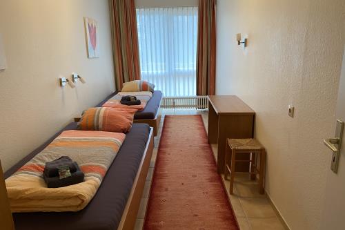 Borkum Ferienwohnung Möwennest II, Wohnung33 - Schlafzimmer